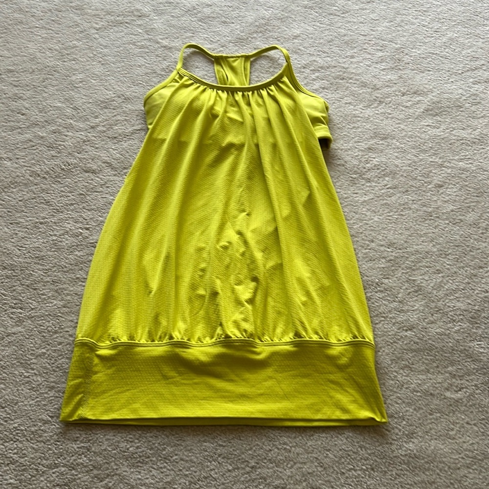 Women’s lululemon loose fitting with attached bra yoga top Size 4
